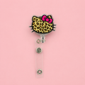 “Wild kitty” badge reel